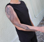 Chaim Machlev Makes Trippy Geometric Tattoos