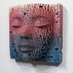 These Pixelated Sculptures of Human Faces Are Strangely Captivating