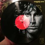 Artist Paints Celebrity Portraits on Vinyl Records